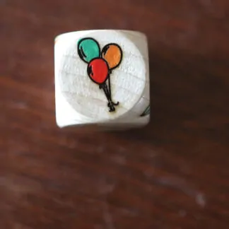 1 Dé à Histoire multi : ballons, landau, crayon, baguette magique, ciseaux, manteau