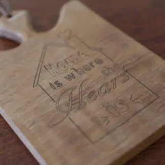 Petite Planche à découper ou de présentation en Iroko 22cm "Home"